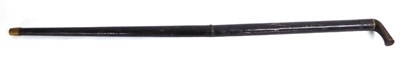 Lot 541 - A 19th Air Cane, with black japanned haft, the air chamber with horn handle, the sighted barrel...