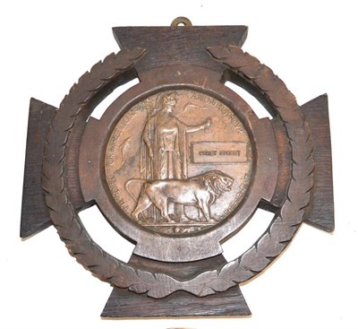 Lot 51 - Two First World War Memorial Plaques, one to PERCY STOREY, in an oak frame carved as Victoria...