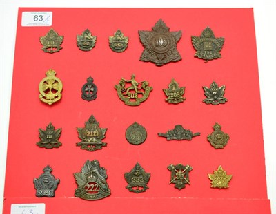 Lot 63 - A Collection of Thirty Second World War Canadian Cap and Collar Badges, in bronze, white metal...