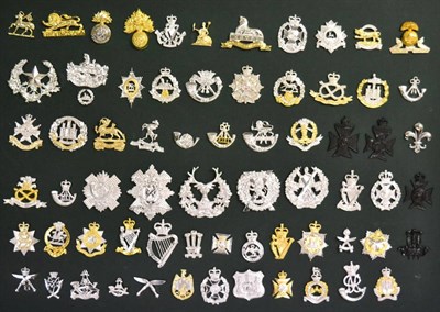 Lot 66 - A Collection of Sixty Eight British Military Staybrite Cap and Collar Badges, loosely mounted...