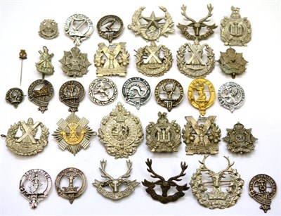 Lot 74 - A Collection of Approximately Thirty Scottish Glengarry Badges and Plaid Brooches, in bi-metal...