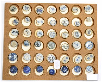 Lot 85 - A Collection of Forty Two Chinese Porcelain Gaming Tokens, blue and white, oval and circular,...