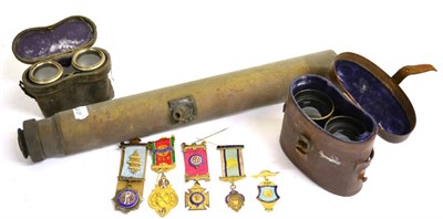 Lot 123 - Militaria, comprising a brass gun sight, a pair of First World War Military binoculars, stamped...