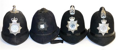 Lot 162 - Four Various Police Helmets, two with combs and chrome helmet plates to Northumbria Police, one...