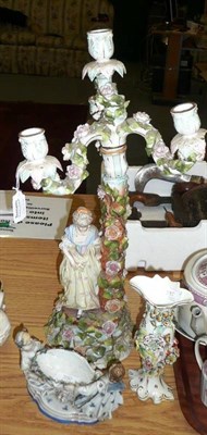 Lot 785 - A Continental Porcelain Encrusted Figural Candelabra