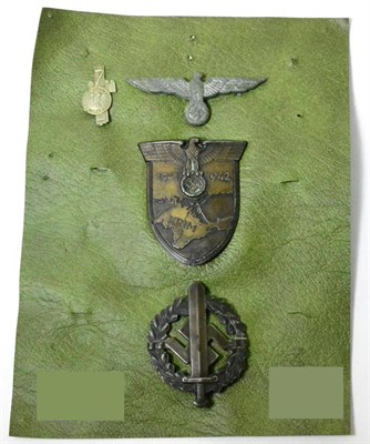 Lot 184 - A German Third Reich Krim Arm Shield, with four blade fixing to the back (one broken) and with...