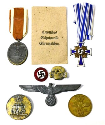 Lot 206 - A Collection of Seven German Third Reich Badges, comprising a Mother's Cross, NSDP enamel...