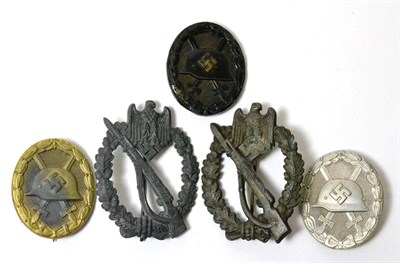 Lot 207 - Five German Third Reich Badges, comprising three Wound badges and two Infantry Assault badges (5)