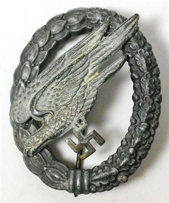 Lot 208 - A German Third Reich Luftwaffe Paratrooper's Badge, in zinc, the eagle and swastika bearing...