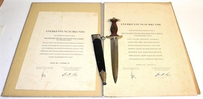 Lot 215 - A German Third Reich NSKK Dagger, de-Nazified, the steel blade etched Alles Fur Deutschland and...