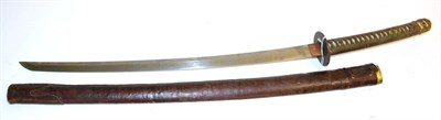 Lot 231 - A Second World War Japanese Katana, the 63cm blade with signed tang and Showa stamp, one piece...