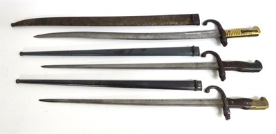 Lot 254 - A French Model 1866 Chassepot Yataghan Sword Bayonet, the back edge of the blade engraved and dated