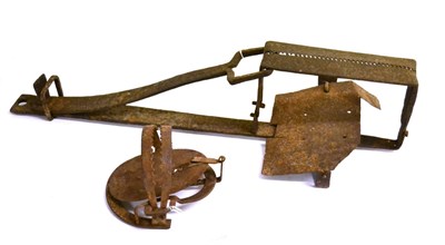 Lot 256 - A 19th Century Iron Mantrap,  with rectangular jaws and tilting footplate, 74cm; a 19th Century...