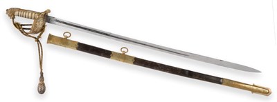 Lot 279 - A Late Victorian Lloyd's Presentation Naval Sword, the 79.5cm single edge steel blade etched...