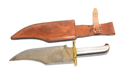 Lot 280 - A Bowie Knife, the 19cm heavy clip-point steel blade etched with a skull and crossed bones within a