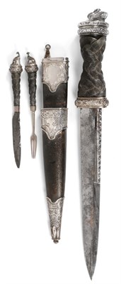 Lot 287 - A Victorian Silver Mounted Dirk, the 28cm scallop back steel blade stamped Paget, 195,...