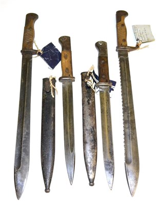 Lot 298 - Four German Bayonets:- two 1898/05 Butcher bayonets, second pattern, one with saw back, lack...