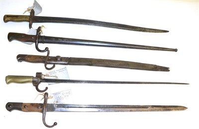 Lot 299 - Five Bayonets:- a French Model 1866 Chassepot Yataghan sword bayonet, lacks scabbard; a French...