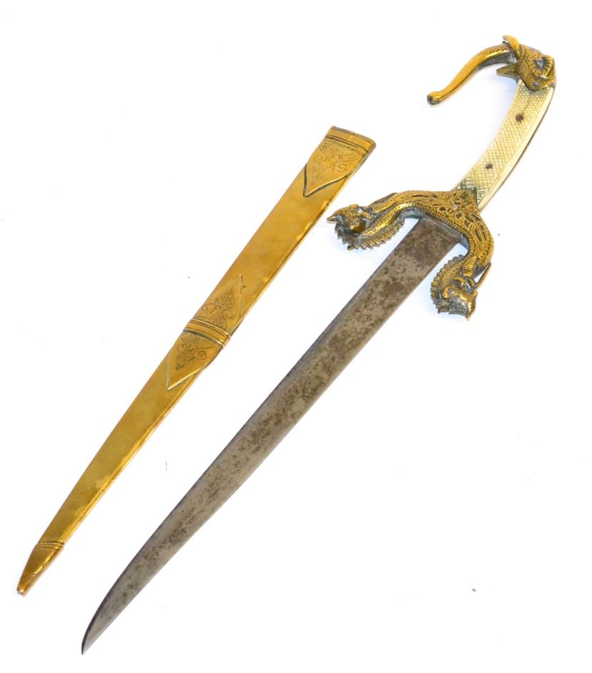 Lot 312 - A 19th Century Burmese Knife, with 27cm single edge steel blade, the brass hilt with down-swept...