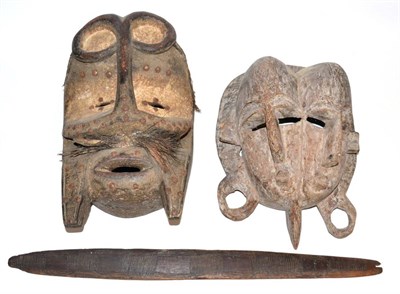 Lot 313 - A Bete, Ivory Coast Wood Mask, with bar nose looping up to form the eyebrows, recessed slit...