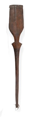 Lot 318 - A 19th Century Polynesian Carved Wood Paddle Club, the oar shape head and flattened tapering...