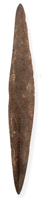 Lot 319 - A 19th Century Aborigine Carved Wood Parrying Shield, of elliptical form, the fascia carved...