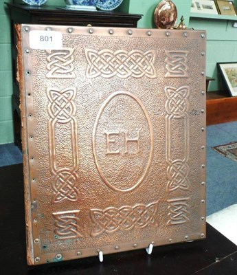 Lot 801 - An Embossed Brass Blotter Pad with initials EH, possibly Keswick School