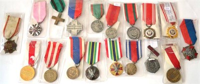 Lot 1 - A Collection of Twenty-two Polish Medals, comprising:- three Medals of Merit for National...