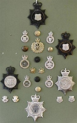 Lot 79 - A Collection of Northumberland City and County Police Badges, including two helmet plates to Durham