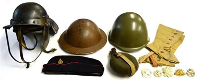 Lot 99 - A Collection of Militaria, comprising a Second World War Brodie helmet, painted brown, indistinctly