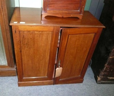 Lot 821 - A Walnut Double Door Cabinet, early 20th century rectangular top above two cupboard doors