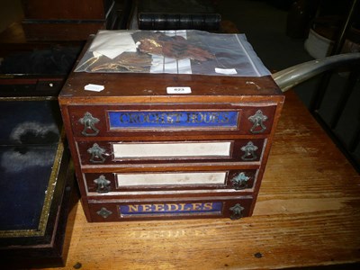 Lot 823 - A Victorian Shop Sewing Accessories Chest, and two pairs of Winky's first kid gloves