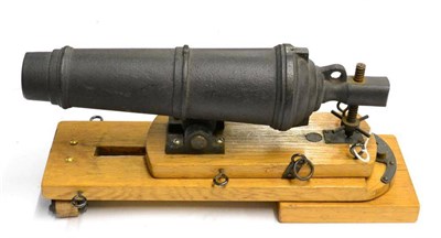 Lot 135 - A Non-working Model of an Early Signal Cannon, with 20cm iron three stage barrel, with rack and...