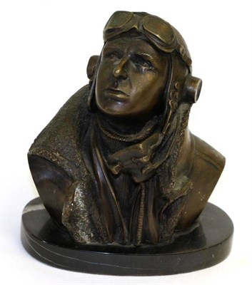 Lot 139 - A Cast Bronze Bust Depicting a Second World War R.A.F. Fighter Pilot, wearing battle dress,...