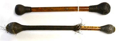 Lot 159 - Two 19th Century ";Life Preservers";, one with lead weighted ends joined by a cane haft with...