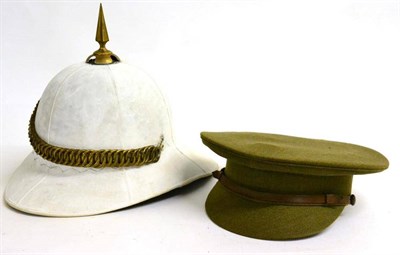 Lot 167 - An Edwardian Wolseley Pattern Spiked Tropical Helmet, in white cloth, the skull made up of six...