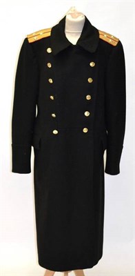 Lot 188 - A Russian Naval Black Wool Greatcoat to a Senior Lieutenant, Coastal Service, with crimson and gold