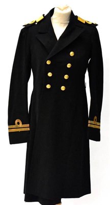 Lot 196 - A Royal Navy Lieutenant's Frock Coat, circa 1930s, together with four pairs of Naval Officers'...