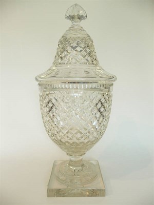 Lot 1 - A Cut Glass Pedestal Vase and Cover in Georgian Style, 20th century, the cover of bell form...