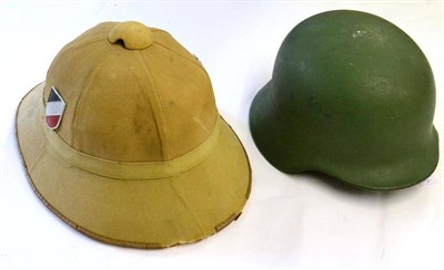 Lot 218 - A German Third Reich Army Tropical Helmet, with six panel crown and four panel brim, applied...