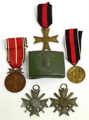 Lot 222 - Five German Third Reich Medals, comprising a bronze War Merit Cross, second class; two further...