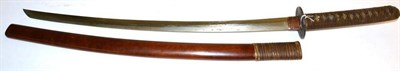 Lot 253 - A Second World War Japanese Katana, with 67 cm blade, one piece copper habaki, the iron tsuba...