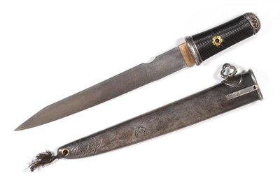 Lot 262 - A 19th Century Japanese Kaiken Tanto, the 19cm clip point blade signed below a cut-out finger rest.