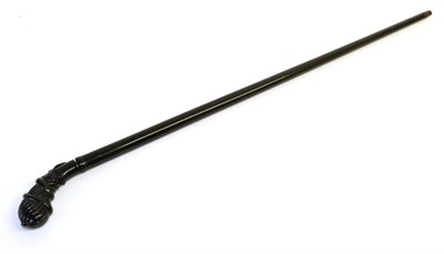 Lot 305 - An Early 20th Century Ebony Swordstick, with 51 cm double edge blade, brass collar, fluted, bulbous