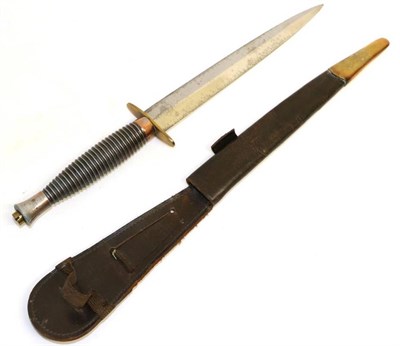 Lot 330 - A Copy of a Fairbairn Sykes Fighting Knife, third pattern, with brass crossguard, plated hilt,...