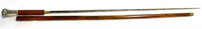 Lot 399 - A Late 19th Century Malacca Swordstick, the 67.5cm diamond section steel blade bearing traces...