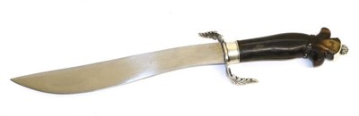 Lot 401 - A Balkan Knife, with 20cm scimitar type blade, white metal recurving crossguard pierced and cast as