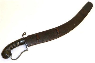 Lot 414 - A 19th Century Malayan Sword, the 53cm curved steel kilidj type blade with two narrow fullers...