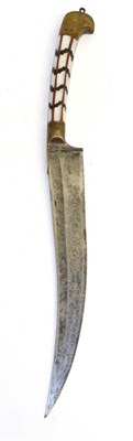 Lot 426 - A 19th Century Indian Small Kard, the 16cm single edge curved steel blade with a narrow fuller...