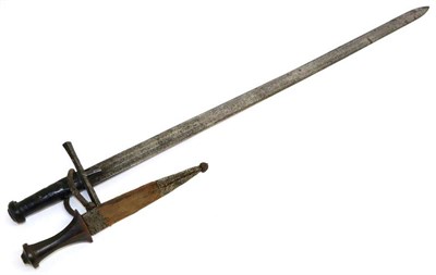 Lot 437 - An Early 19th Century Sudanese Kaskara, the 90cm double edge steel blade with a central narrow...